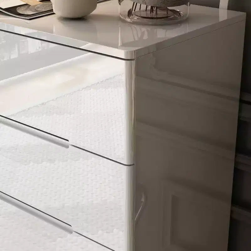 Commode à 5 tiroirs laquée brillante avec poignée dissimulée et éclairage sous-jacent